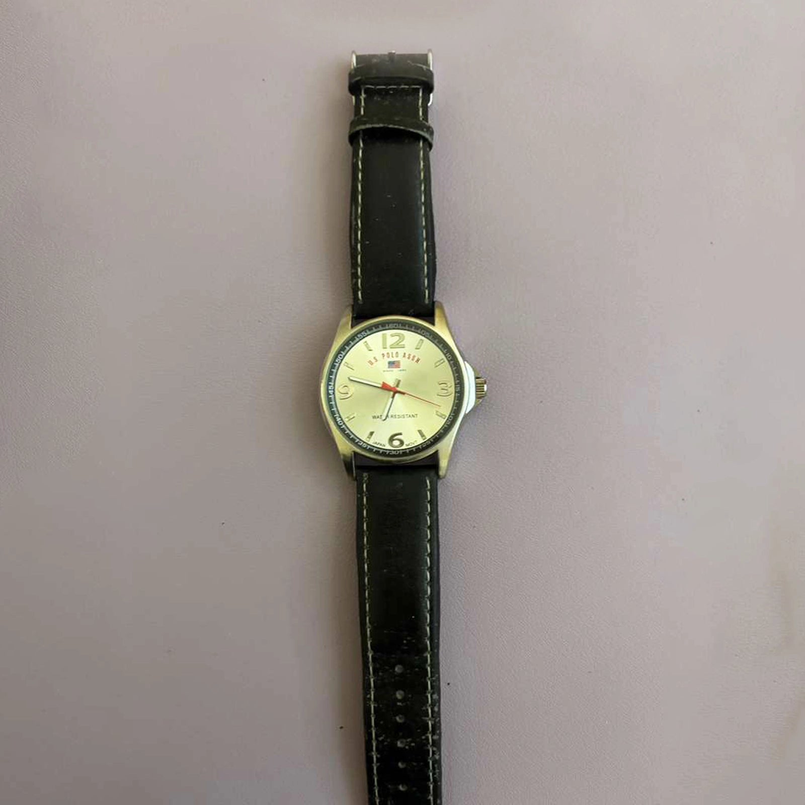 U.S. Polo Assn. Men’s Quartz Watch – Silver Case, Cream Dial, Black Leather Strap